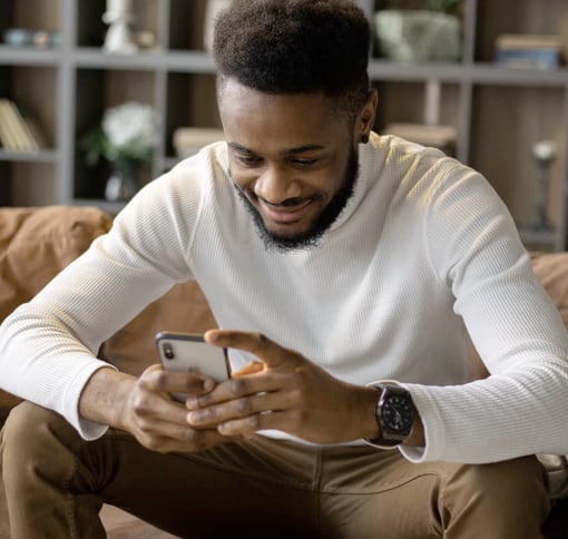 A man texting using his phone